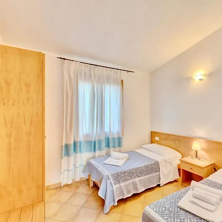 Aparthotel Isa-residence With Swimming-pool In Badesi, With Air Conditioning And Private Outdoor Space Badesi